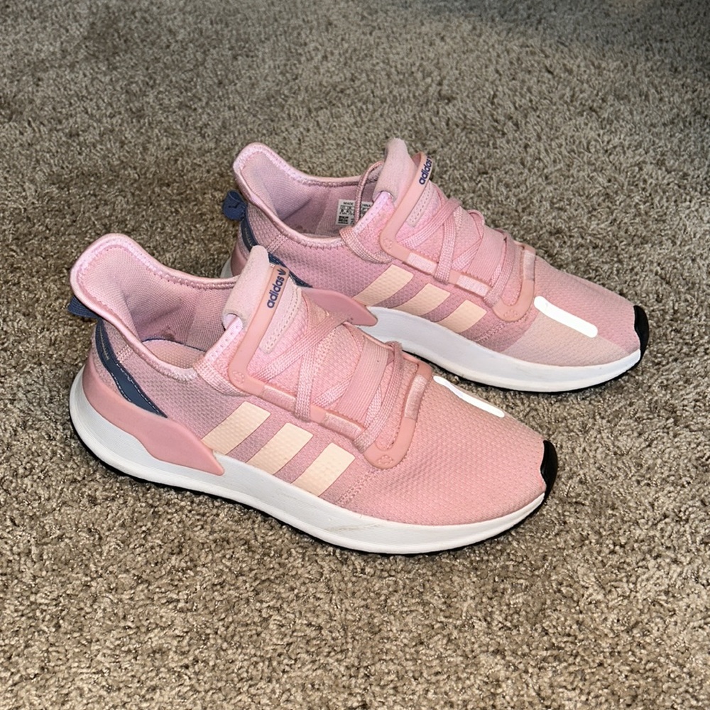 Woman’s pink Adidas tennis shoes (size 8)
